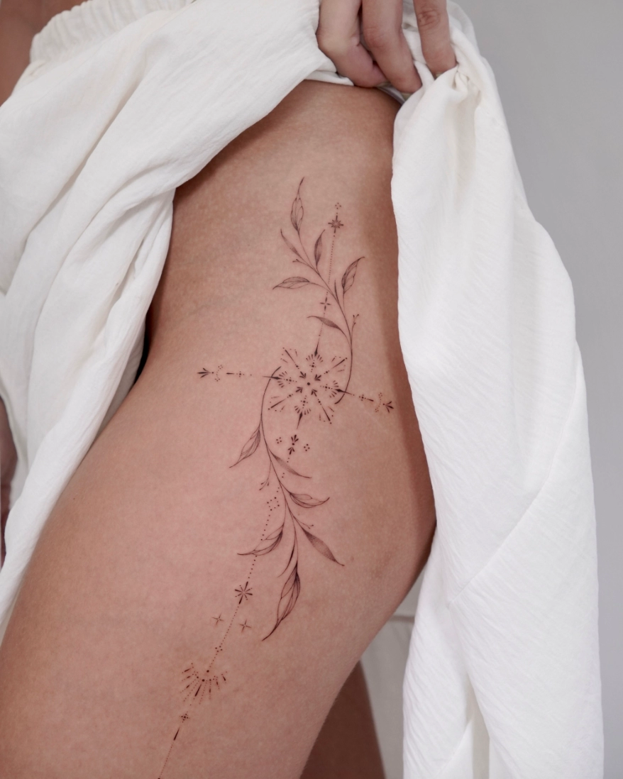 1747563835-fineline-tattoo-thigh-leaves