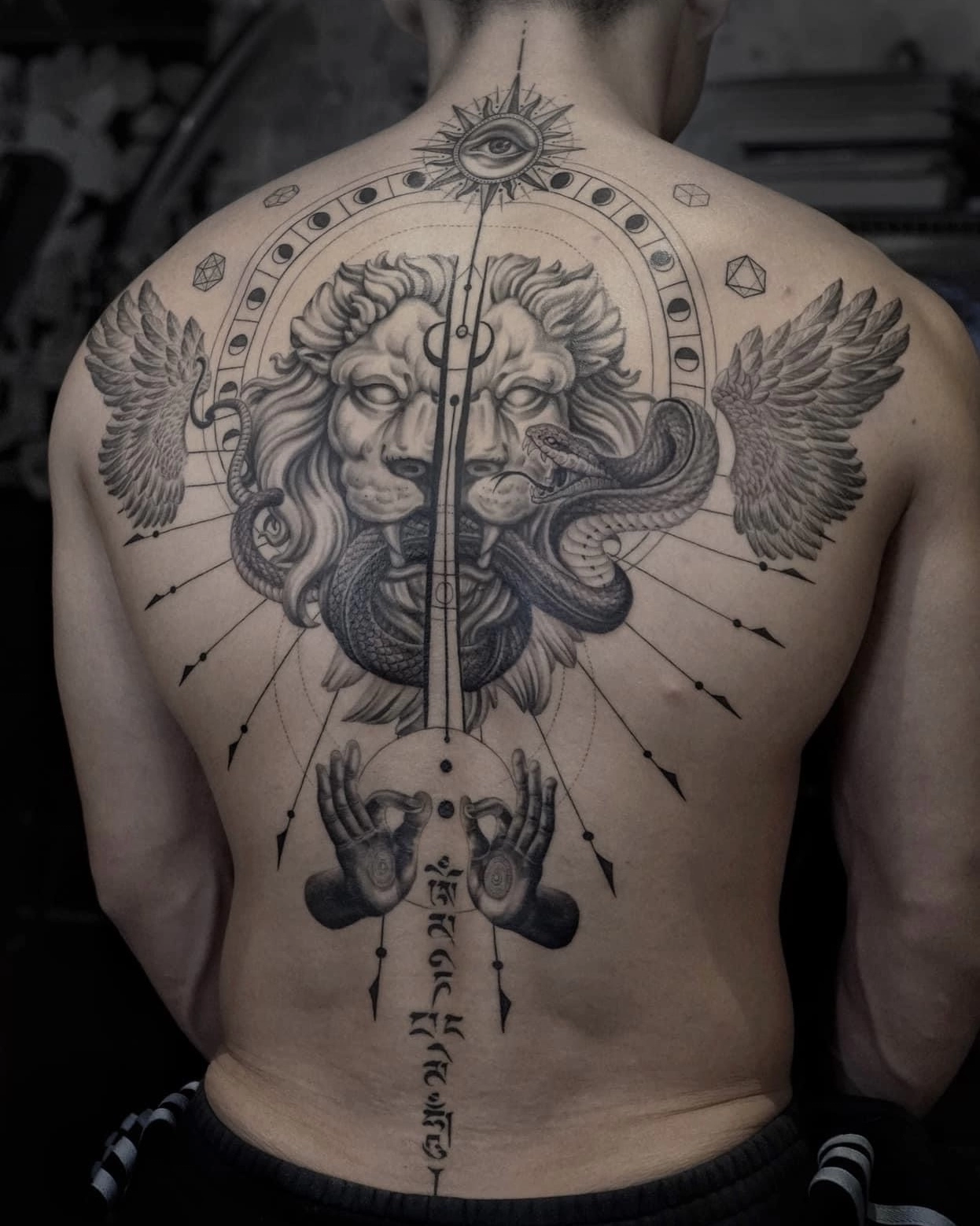 1747618268-graphic-tattoo-back
