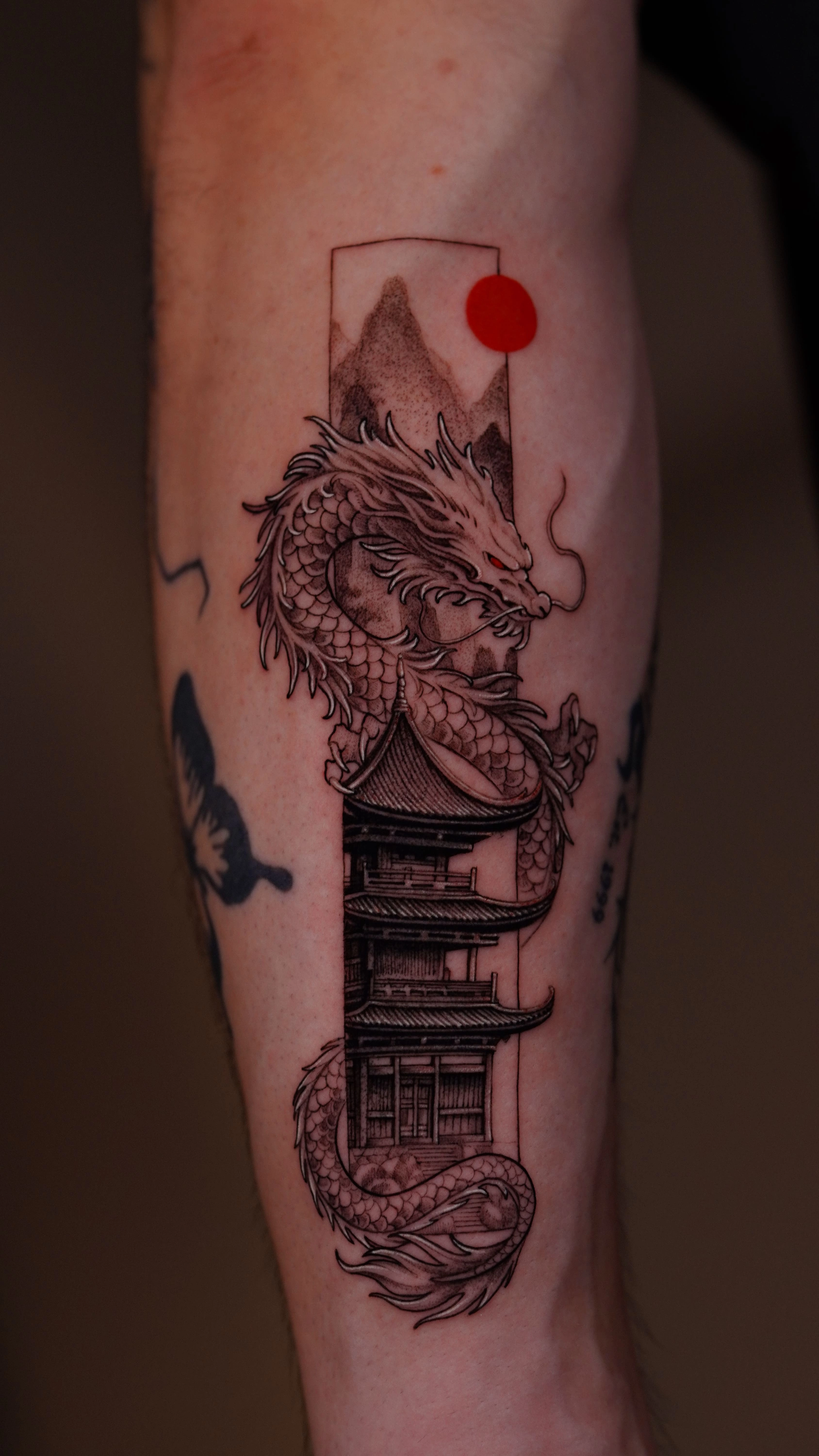 American Trad Dragon Tattoo and Its Symbolic Meaning in Old School Tattoo Art